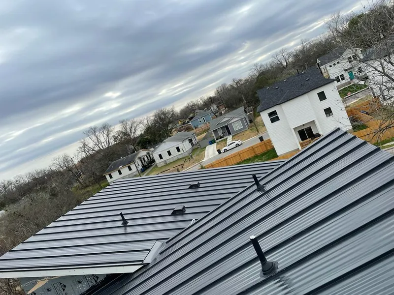 Standing seam metal roof panels with vents for Skylight Repair in Inverness